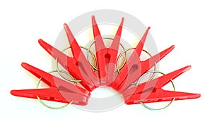 Five red pegs situated around