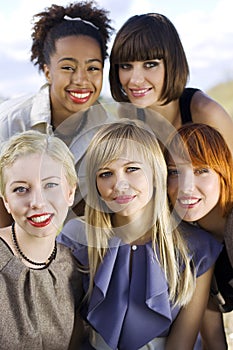 Five smiling women.