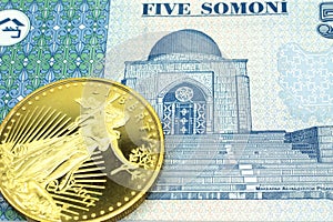 A five somoni note from Tajikistan with a gold coin in macro