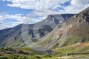 Five Springs Point viewed from Highway Fourteen leaving the Bighorn Mountains in north central Wyoming on a sunny afternoon