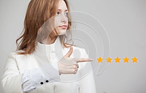 Five star rating or ranking, benchmarking concept. Woman assesses service, hotel, restaurant