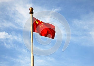 The five-star red flag under blue sky