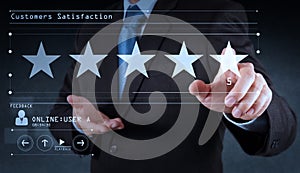 Five stars 5 rating with a businessman is touching virtual computer screen.For positive customer