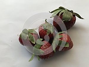 five strawberries isolated on white background . Strawberry isolated. Strawberries with leaf isolate