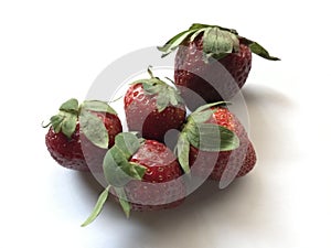 five strawberries isolated on white background . Strawberry isolated. Strawberries with leaf isolate