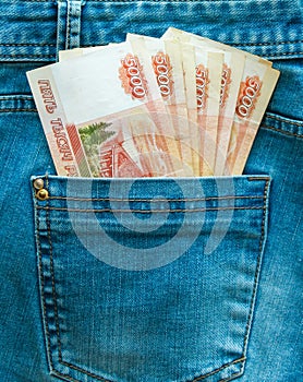 Five thousand rubles in the back pocket of your jeans. The concept of pocket money.