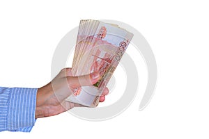 Five-thousandth banknotes of the Russian ruble in a man's hand.male hand with a bundle of banknotes.The isolated