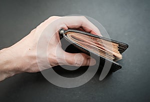 Five-thousandth banknotes in the wallet.