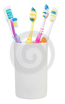 Five toothbrushes in ceramic glass