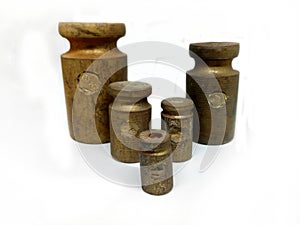 five weights made of brass