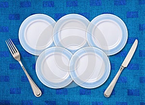 Five white plates