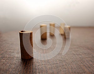 Five Wine Corks staggered on a wooden table