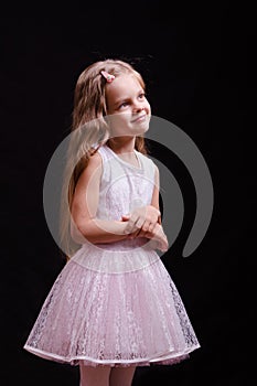 Five-year girl in a beautiful dress white