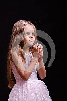 Five-year girl prays