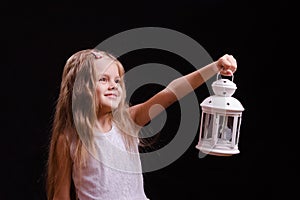 Five-year girl shines candlestick