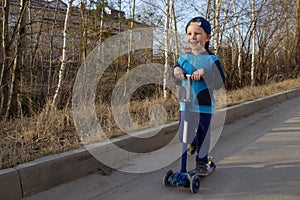 five-year-old boy learns to roller skate. Safe riding