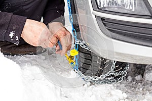 Fix snow chains on car