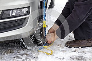 Fix snow chains on car