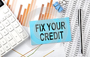 FIX YOUR CREDIT on sticker on chart background, business concept