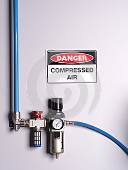 Fixed color coded compressed air line with pressure regulator photo