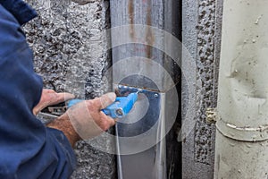 Fixing a leaky gutter downspout 2