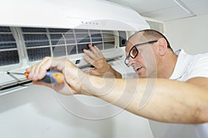 Fixing and maintaining air conditioning system photo
