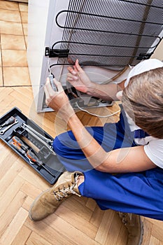 Fixing a refrigerator