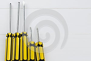 Fixing tools set for home repairing or construction on White woo