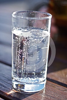 Fizzy drink in glass photo
