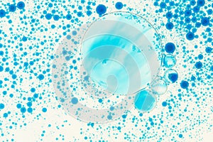 A blue fluid dissolving