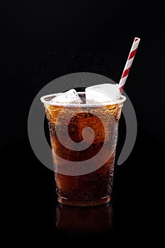 Fizzy Soft Drink On Black Background