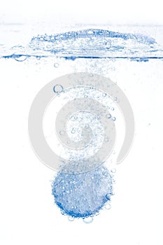 Fizzy tablet dissolving in water