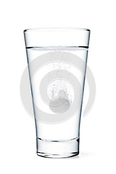 Fizzy tablet in glass of water