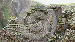 Fjadrargljufur Canyon in misty day