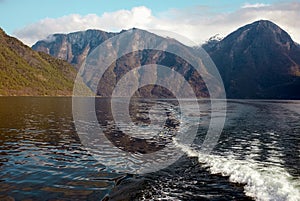 Fjord and a backtrace of a boat