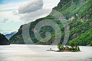 Fjord landscape with hytte on isle, Norway photo