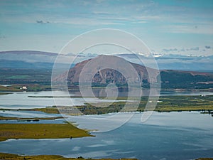 Fjord landscape in Iceland and mountains peninsula in summer, aerial pull out