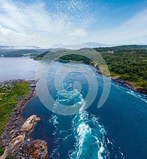 Fjord summer landscape with flowing water. View from bridge (Norway