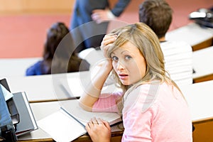 Flabbergasted female student during a class