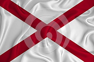 Flag of Alabama in the United States on the background texture. Concept for designer solutions