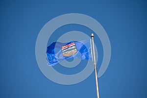 Flag of Alberta wtih a blue sky