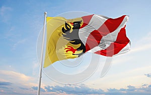 flag of Altdorf, Uri , Switzerland at cloudy sky background on sunset, panoramic view. Swiss travel and patriot concept. copy
