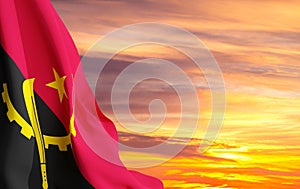 Flag of Angola against the sunset
