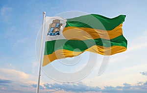 flag of Aracaju , Brazil at cloudy sky background on sunset, panoramic view. Brazilian travel and patriot concept. copy space for