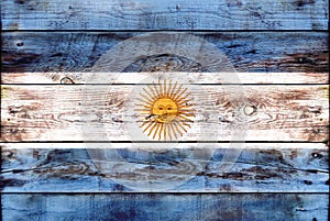 Flag of Argentina painted on grungy wood plank