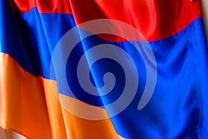 Flag of Armenia. of the Armenian flag waving. red blue apricot color.