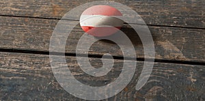 Flag of Austria on a painted egg on a wooden board. Easter in Ukraine. Painted eggs.