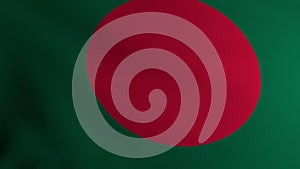 The flag of Bangladesh flutters in the wind. Symbol of statehood and sovereignty of the country. Testura fabric on the