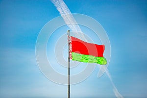 Flag of Belarus against blue sky