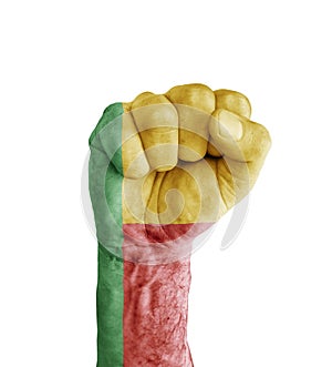Flag of Benin painted on human fist like victory symbol